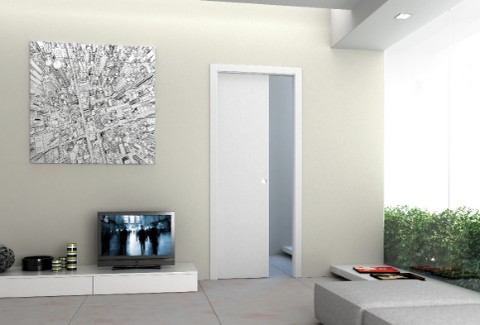 Eclisse UNICO EF - Schiebetür in der Wand laufend - Serie UNICO Trockenbau - Ausführung EF als Szenebild in Wohnzimmer